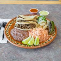 Ground Beef & Potato Taco Plate · 3 tacos with rice and beans .