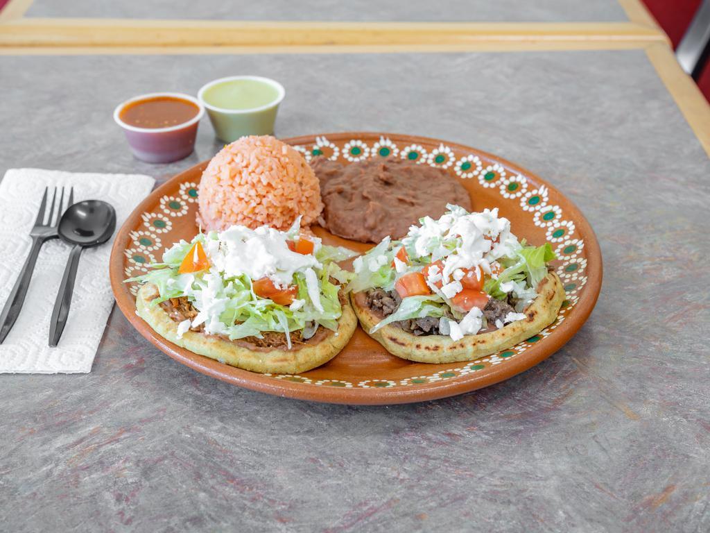 Pastor Sope Plate · 2 sopes (corn) with beans, meat, lettuce, queso fresco, tomatoes & sour cream. Served with rice and beans.