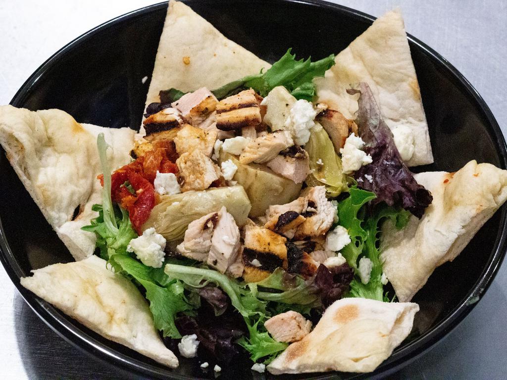 Grilled Chicken Salad · Artichokes, sun-dried tomatoes, blue cheese & balsamic dressing.