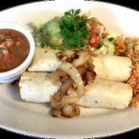 Tacos al Carbon · 2 tacos with choice of meat. Served with rice, benas, grilled onions, pico de gallo and guac...
