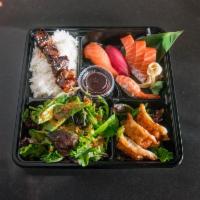 B1. Bento Box · Rice, salad, 3 pieces gyoza, beef yakitori, 3 pieces salmon sashimi, 1 piece tuna, 1 piece s...