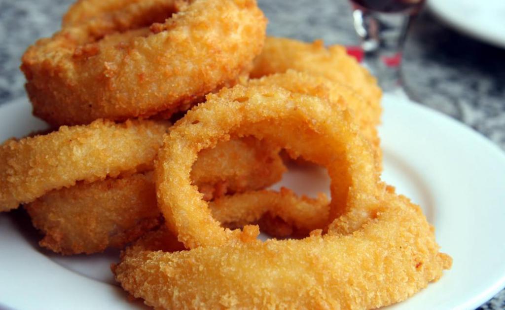 Basket of Onion Rings · Fried battered onions.