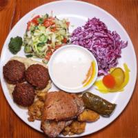 The Hesitator Combo · Falafel, chicken, shawarma, lamb gyro, Arab salad, purple slaw, pickled veggies, organic hum...