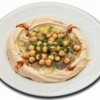Hummus & Pita · Organic homemade hummus topped with za'atar paprika and olive oil. Served with fresh homemad...