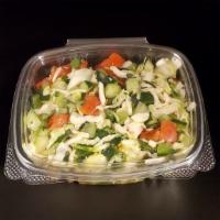 Arab Salad · Finely chopped cucumber, tomato, cabbage parsley and fresh-squeezed lemon juice, tossed with...