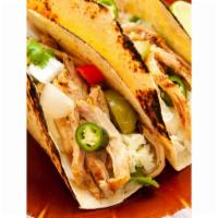 Chicken Taco · Served with cream, cheese, onion and cilantro on a 6