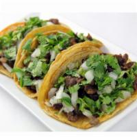 Steak Taco · Served with cream, cheese, onion and cilantro on a 6