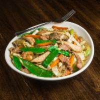 Pancit Bihon · Sauteed tin rice noodles and mixed vegetables with shredded chicken, pork and shrimp.