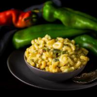 Green Chile Mac-n-Cheese  (Vegetarian) · Spicy.  Add smokey mushrooms or spicy Hatch green chile jackfruit for an additional charge.