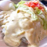 Green Chile Burrito · Stuffed with Hatch Green Chile Brisket-n-Pork & Cheese topped with Enchilada Sauce: Hatch Gr...