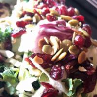 Super-Food Salad · Brussels, kale, cabbage, broccoli, radicchio, pumpkin 
seeds, craisins. 