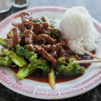 Beef and Broccoli · Served with choice of rice and an eggroll.