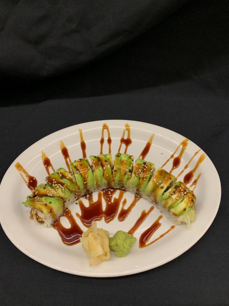 Dragon Roll · Eel and cucumber inside. Topped with avocado.