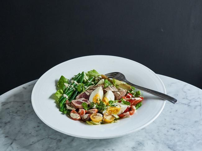 Salade Niçoise · Seared tuna loin, Haricot verts, Tomato, Red peppers, Hard boiled egg, Kalamata olives, Fingerling potatoes, Greens, Dijon vinaigrette