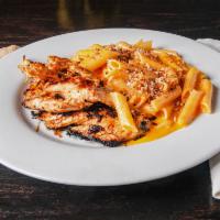 Senne Chicken and Mac and Cheese · House marinated chicken served with a side of our homemade three-cheese blend Mac & cheese.