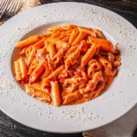 Penne Vodka · A delicious blush cream sauce with fresh herbs, tomatoes & parmesan tossed with penne pasta.
