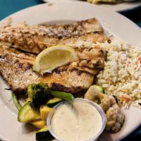 Grilled Rainbow Trout Platter · Mesquite-grilled and served with rice pilaf, vegetables, and sauce.