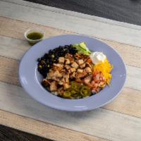 Southwestern Bowl · Blackened chicken with rice, black beans, roasted corn, cheddar cheese, pico de gallo, sour ...