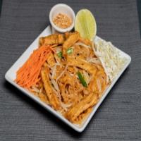 PAD THAI NOODLE (KUYTEAV KOH KONG) · Our version of Pad Thai. Stir-fried and prepared with rice noodles, battered egg, tamarind s...