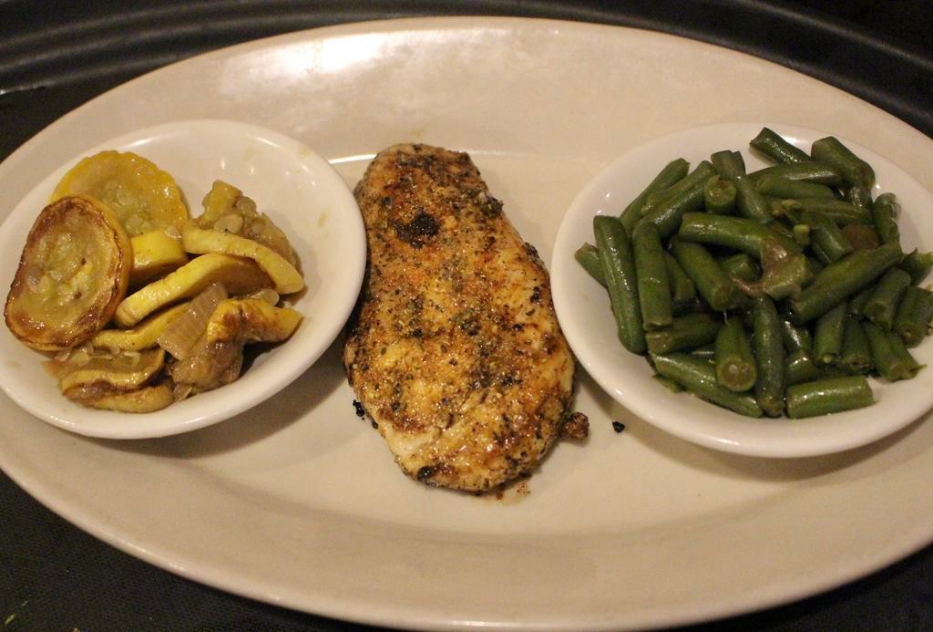 Garlic & Herb Chicken Breast · Grilled chicken breast seasoned with a special blend of garlic & herbs; served with 2 sides.