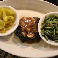 Hamburger Steak · A grilled hand-pattied hamburger steak topped with your choice of gravy; served with 2 sides.