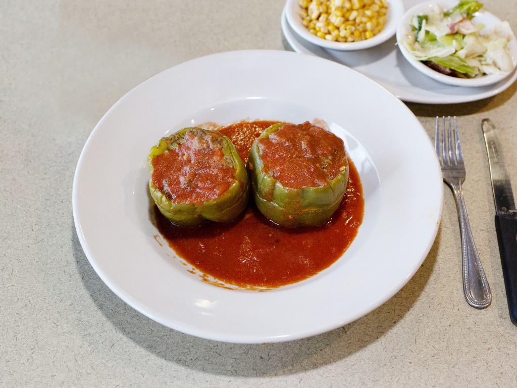 Stuffed Pepper · Green bell pepper(s) stuffed with Grandma’s homemade meatloaf and topped with a tomato gravy. Served with 2 sides and choice of bread.