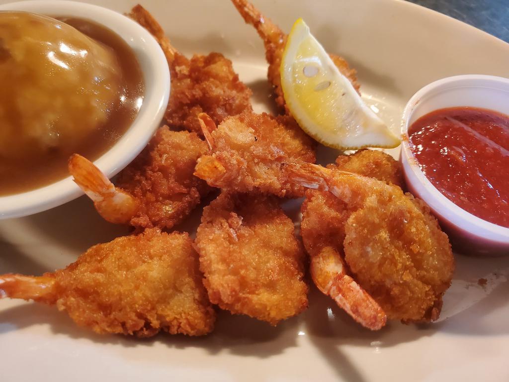 Butterfly Shrimp Basket · Lightly breaded and fried butterfly shrimp with a side of cocktail sauce. Served with 1 side