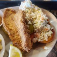 Catfish Sandwich · Grilled or fried catfish filet served on a toasted hoagie w/ pickle, tomato, our homemade sl...