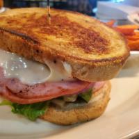 Grilled Ham & Swiss · Sliced ham grilled & served on toasted rye w/ melted swiss, lettuce & tomato