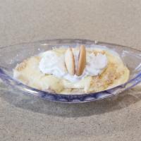 Banana Pudding · Banana pudding with whipped cream and vanilla wafers.