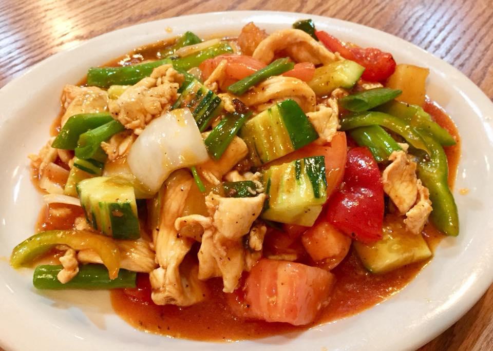 Sweet and Sour · Stir fried onions, pineapple, tomatoes, cucumbers and bell peppers in sweet and sour sauce. Served with jasmine rice.