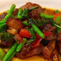 Spicy Basil Crispy Pork Belly · Sauteed bell pepper, green beans, onions, chili and basil with crispy pork belly. Includes j...