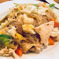 Pad Woon Sen · Thin glass noodle, egg, onions, bell peppers, celery, tomatoes and scallions in lightly swee...