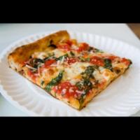 Grandma Pizza Slice · Made of homemade marinara sauce,fresh mozzarella cheese,Parmesan,oil,fresh ,basil.