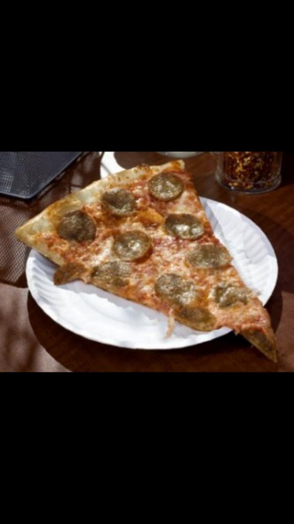 Sausage Pizza Slice · Made of mozzarella cheese,sausage,marinara sauce.
