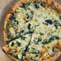 White Spinach Pizza Slice · Made of spinach,ricotta cheese,mozzarella cheese.