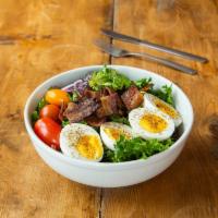 Bacon and Egg Salad · Hard boiled farm eggs with backyard bacon, farm lettuce, and red wine vinaigrette.