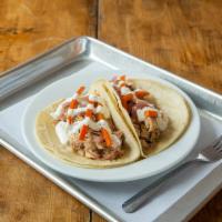 Chicken Tacos · Comes with braised chicken, pickled vegetables, and oregano lime sour cream.