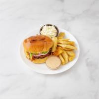 Chipotle Chicken Burger · Delicious blend of grilled ground chicken breast and herbs, topped with American bacon, red ...