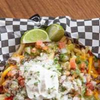 Carne Asada Fries · Crispy fries with fresh grilled carne asada beef, salsa, cheese, and lime.
