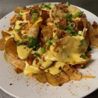 Cheesy Beer Chips · House-made potato chips topped with Old Bay seasoning, cheddar cheese, pale ale beer cheese,...