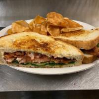 BLT Sandwich · Bacon, lettuce, tomato and mayonnaise. Served on grilled sourdough bread. Served with your c...