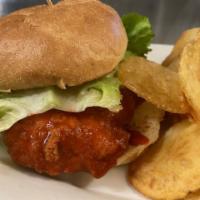 Buffalo Chicken Sandwich · Boneless chicken fried to perfection, tossed in a zesty hot sauce and topped with lettuce an...