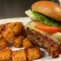 Don't Go Bacon My Heart · ½ pound Angus burger topped with house-made bacon jam,
more bacon, pepper jack cheese, lettu...