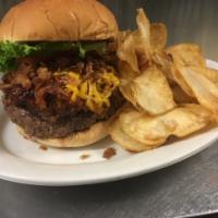 Barnyard Shuffle Burger · ½ pound Angus burger topped with pulled pork,
tangy BBQ sauce, cheddar cheese, and onion str...