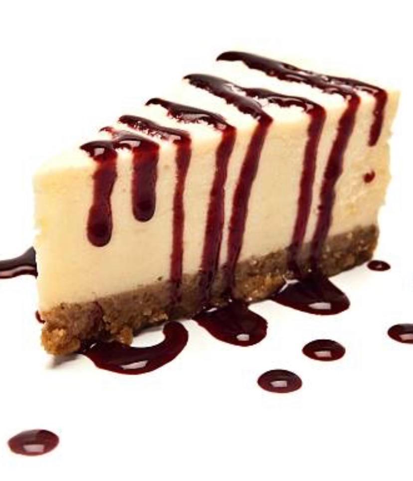NY Style Cheesecake · Creamy cheesecake topped with your choice of raspberry sauce, or chocolate sauce and whipped cream.