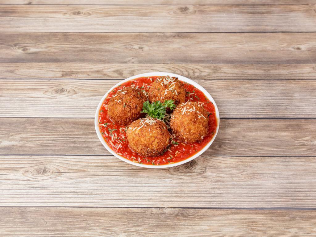 Fried Risotto Balls · Stuffed with pancetta, red pepper, parmesan, mozzarella, served over marinara