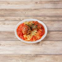 Housemade Meatballs · Over creamy polenta, marinara and Parmesan cheese.