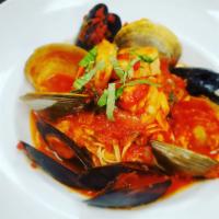 Frutti Di Mare · Capellini tossed with shrimp, mussels, scallops, littlenecks, calamari and spicy marinara.