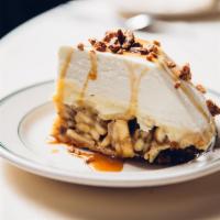 Banana Cream Pie · Sliced Bananas, Caramel Custard, Topped With Whipped Cream and Foster Sauce